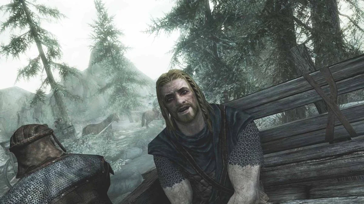 das-schicksal-des-aldmeri-dominions-in-the-elder-scrolls-6_img_0 | etalongame.de Ralof sitzt in einem Gefangenenwagen und unterhält sich mit dem Drachenblut während des Skyrim-Intros.