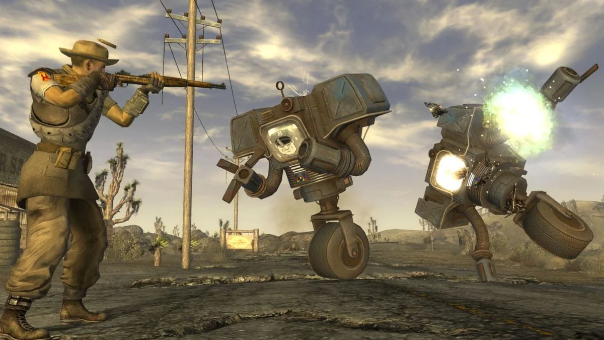 fallout-new-vegas-und-die-ruckkehr-zu-den-wurzeln-des-rollenspiels_img_0 | etalongame.de Ein Spieler schießt auf Securitrons in einem der besten Einzelspieler-Spiele, Fallout: New Vegas.