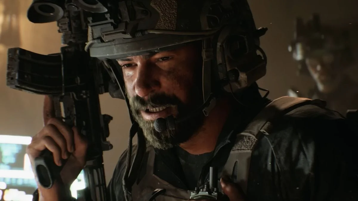 battlefield-6-veroffentlichungstermin-beta-daten-und-gameplay-details_img_2 | etalongame.de Ein Battlefield 6 Soldat aus dem Enthüllungs-Trailer hält eine Waffe, mit dem Finger am Abzug.